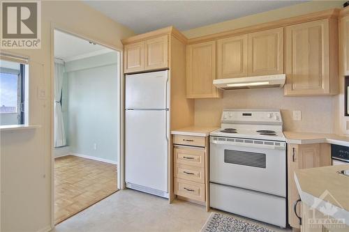 Bright kitchen thanks to large windows in dining room - 1285 Cahill Avenue Unit#1303, Ottawa, ON - Indoor Photo Showing Kitchen