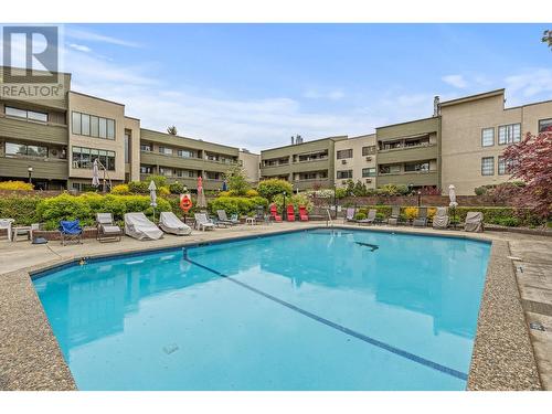 1056 Bernard Avenue Unit# 310, Kelowna, BC - Outdoor With In Ground Pool