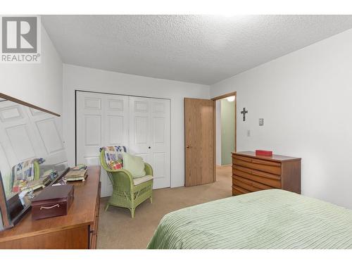 1056 Bernard Avenue Unit# 310, Kelowna, BC - Indoor Photo Showing Bedroom