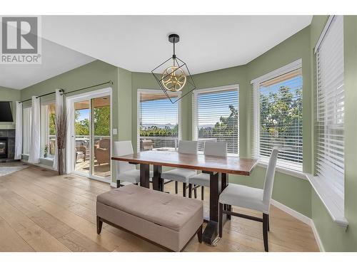 2111 Horizon Drive, West Kelowna, BC - Indoor Photo Showing Dining Room With Fireplace