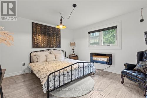 19 Minstrel Court, Hamilton (Mountview), ON - Indoor Photo Showing Bedroom With Fireplace