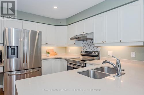 18 Carrington Place, Guelph (Guelph South), ON - Indoor Photo Showing Kitchen With Double Sink