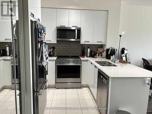 1411 - 35 Watergarden Drive, Mississauga (Hurontario), ON - Indoor Photo Showing Kitchen With Double Sink