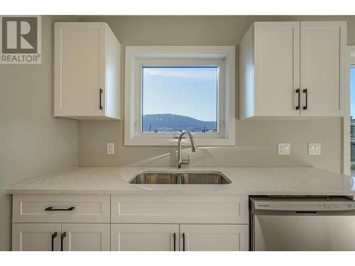 5640 51St Street Unit# 204, Osoyoos, BC - Indoor Photo Showing Kitchen With Double Sink