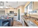 5640 51St Street Unit# 203, Osoyoos, BC  - Indoor Photo Showing Kitchen With Double Sink With Upgraded Kitchen 