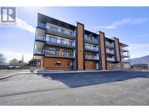 5640 51St Street Unit# 203, Osoyoos, BC - Outdoor With Balcony With Facade