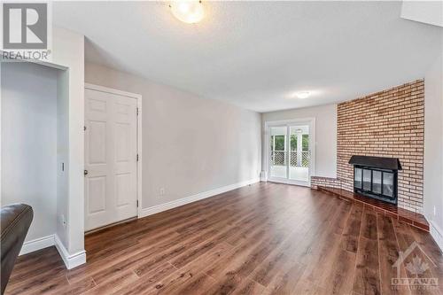 26 Fortune Street, Richmond, ON - Indoor Photo Showing Other Room With Fireplace