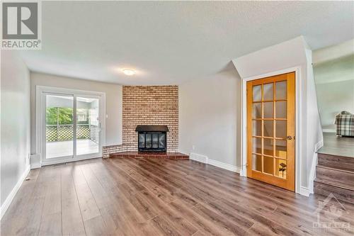 26 Fortune Street, Richmond, ON - Indoor Photo Showing Living Room With Fireplace