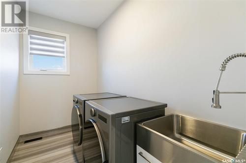 255 Flynn Cove, Saskatoon, SK - Indoor Photo Showing Laundry Room