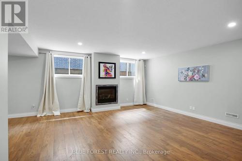 2105 Springridge Drive, London, ON - Indoor Photo Showing Living Room With Fireplace