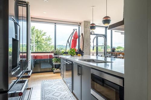 101 Locke Street S|Unit #304, Hamilton, ON - Indoor Photo Showing Kitchen With Double Sink