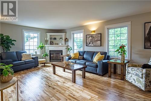 3367 Woodstock Road, Fredericton, NB - Indoor Photo Showing Living Room With Fireplace