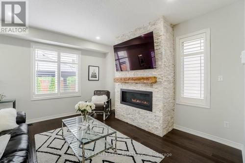 79 Padua Crescent, Hamilton (Stoney Creek), ON - Indoor Photo Showing Living Room With Fireplace