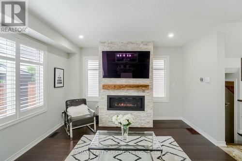 79 Padua Crescent, Hamilton (Stoney Creek), ON - Indoor Photo Showing Living Room With Fireplace