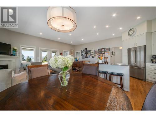 1290 Menu Road, West Kelowna, BC - Indoor Photo Showing Dining Room With Fireplace