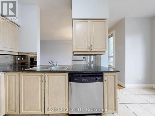 105 - 388 Prince Of Wales Drive, Mississauga, ON - Indoor Photo Showing Kitchen With Double Sink