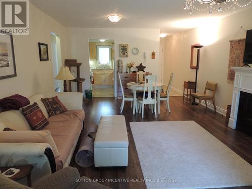 10 - 222 Steel Street, Barrie (Grove East), ON - Indoor Photo Showing Living Room With Fireplace