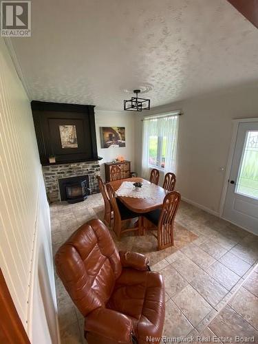 7082 Route 17, Saint-Quentin, NB - Indoor With Fireplace