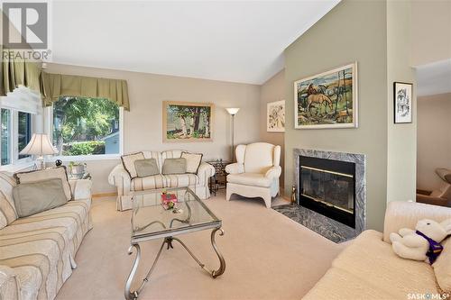 936 Saskatchewan Crescent E, Saskatoon, SK - Indoor Photo Showing Living Room With Fireplace