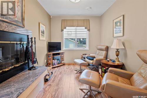 936 Saskatchewan Crescent E, Saskatoon, SK - Indoor Photo Showing Other Room With Fireplace