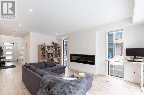 33 - 1820 Canvas Way, London, ON - Indoor Photo Showing Living Room With Fireplace