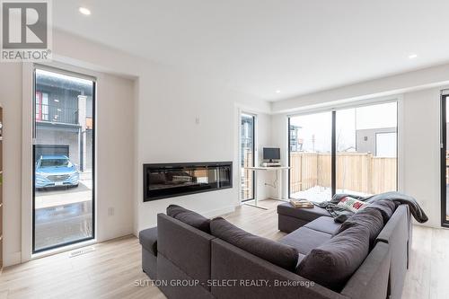 33 - 1820 Canvas Way, London, ON - Indoor Photo Showing Living Room With Fireplace