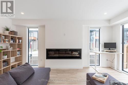 33 - 1820 Canvas Way, London, ON - Indoor Photo Showing Living Room With Fireplace