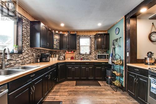 26 Byers Road, Cherryville, BC - Indoor Photo Showing Kitchen With Double Sink