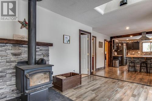 26 Byers Road, Cherryville, BC - Indoor With Fireplace