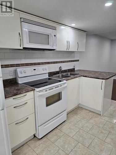 Bsmnt - 16 Northover Street, Toronto (Glenfield-Jane Heights), ON - Indoor Photo Showing Kitchen With Double Sink