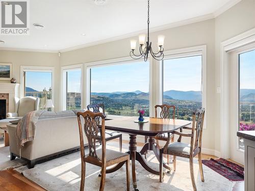 996 Galiano Road, Vernon, BC - Indoor Photo Showing Dining Room With Fireplace