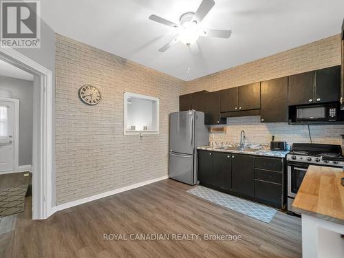 1083 Cannon Street E, Hamilton (Crown Point), ON - Indoor Photo Showing Kitchen With Double Sink