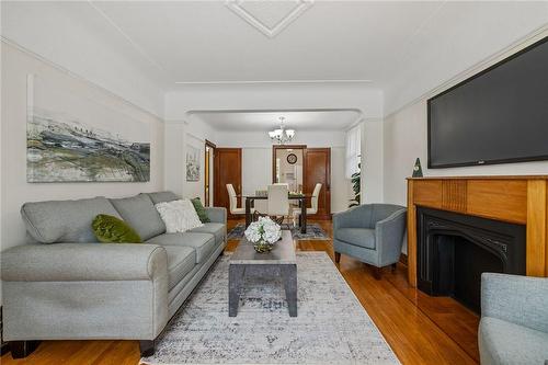 24 Thorndale Street N, Hamilton, ON - Indoor Photo Showing Living Room With Fireplace