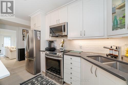 38 John Street S, Mississauga, ON - Indoor Photo Showing Kitchen With Double Sink With Upgraded Kitchen