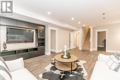 Lower - 69 Mennill Drive, Springwater, ON - Indoor Photo Showing Living Room