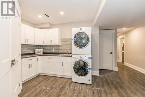 Lower - 69 Mennill Drive, Springwater, ON - Indoor Photo Showing Laundry Room