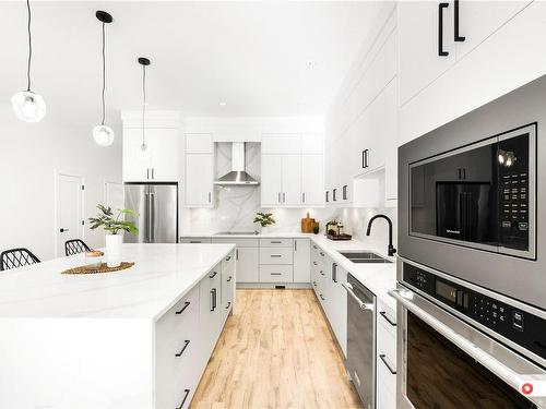 1315 Sandstone Lane, Langford, BC - Indoor Photo Showing Kitchen With Double Sink With Upgraded Kitchen