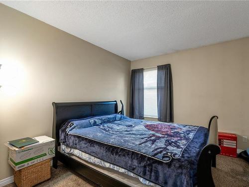 101-585 Dogwood St South, Campbell River, BC - Indoor Photo Showing Bedroom