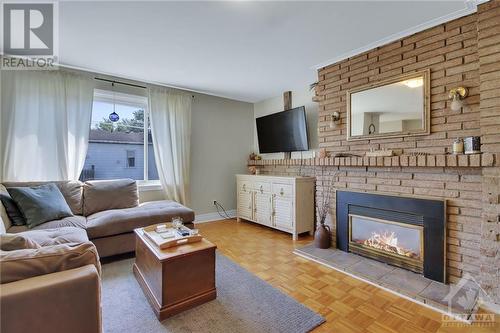 320 Altha Avenue, Ottawa, ON - Indoor Photo Showing Living Room With Fireplace