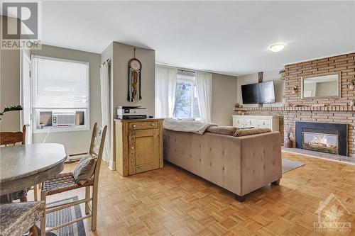 320 Altha Avenue, Ottawa, ON - Indoor Photo Showing Living Room With Fireplace