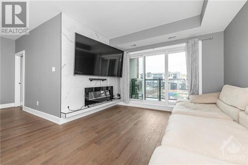 615 Longfields Drive Unit#203, Ottawa, ON - Indoor Photo Showing Living Room With Fireplace