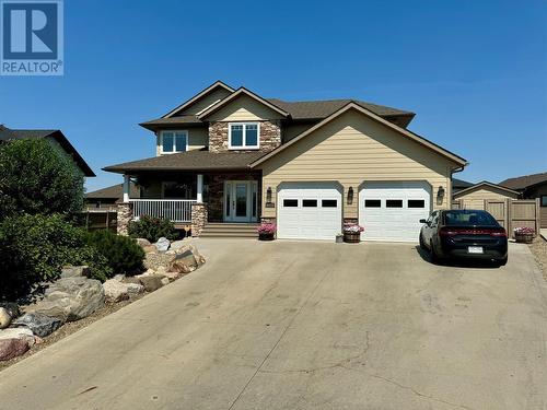 1832 86 Avenue, Dawson Creek, BC - Outdoor With Deck Patio Veranda With Facade