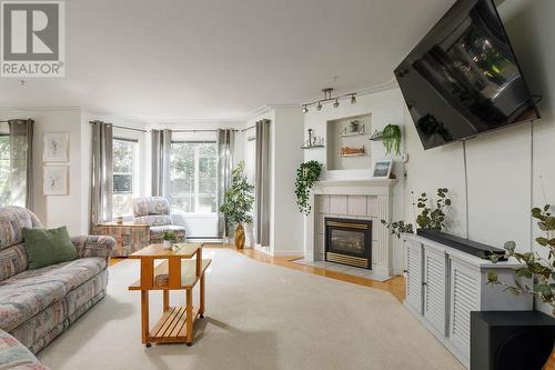 315 Whitman Road Unit# 205, Kelowna, BC - Indoor Photo Showing Living Room With Fireplace