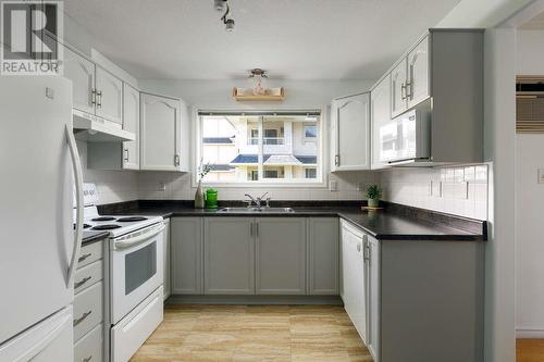 315 Whitman Road Unit# 205, Kelowna, BC - Indoor Photo Showing Kitchen With Double Sink