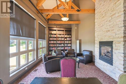 120 - 200 Kingfisher Drive, Mono, ON - Indoor Photo Showing Living Room With Fireplace