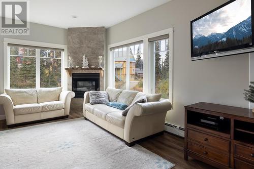 385 Monashee Road, Vernon, BC - Indoor Photo Showing Living Room With Fireplace