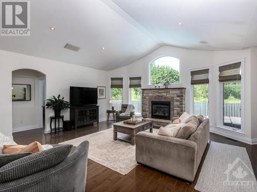 50 Frances Colbert Avenue, Ottawa, ON - Indoor Photo Showing Living Room With Fireplace