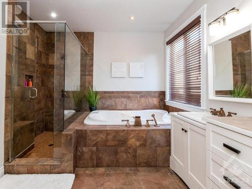 Relax and enjoy the double soaker tub. - 50 Frances Colbert Avenue, Ottawa, ON - Indoor Photo Showing Bathroom