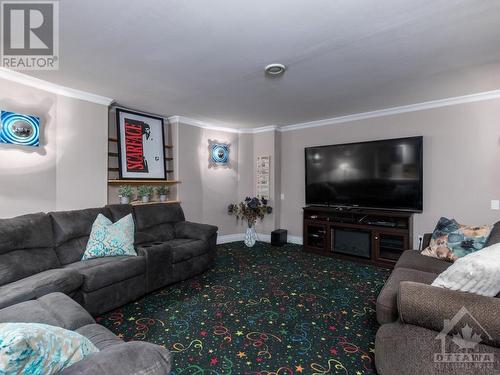 Home theatre. Note new flooring being installed. - 50 Frances Colbert Avenue, Ottawa, ON - Indoor Photo Showing Living Room