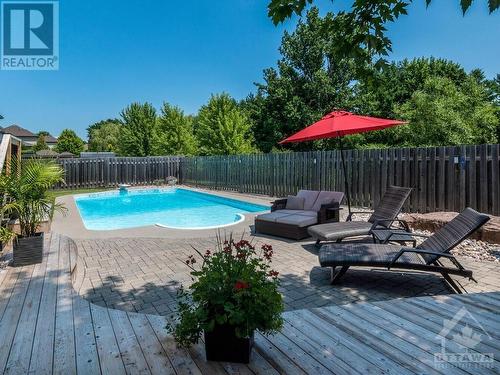 Gorgeous backyard oasis! - 50 Frances Colbert Avenue, Ottawa, ON - Outdoor With In Ground Pool With Deck Patio Veranda With Backyard